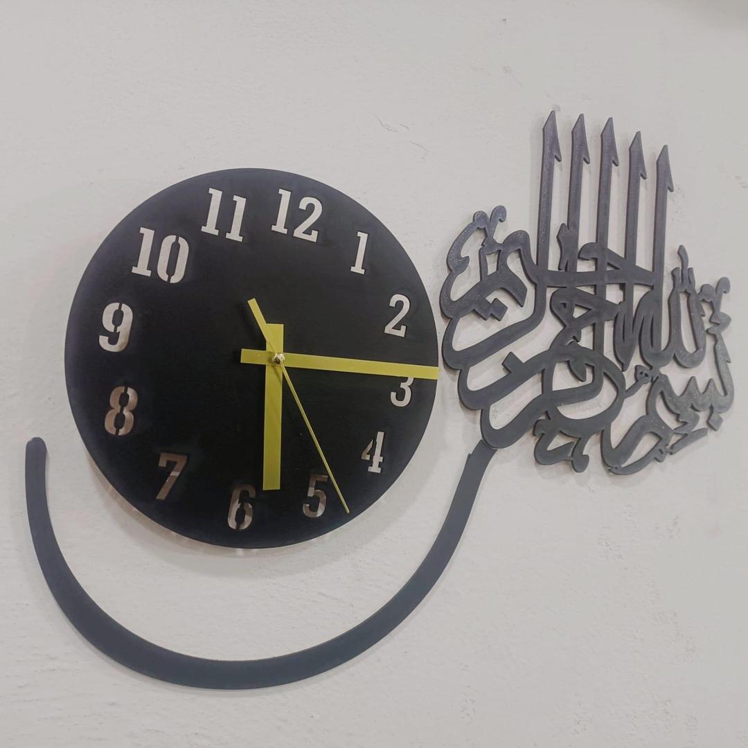 Close-up of black MDF Bismillah calligraphy wall clock with numbered face