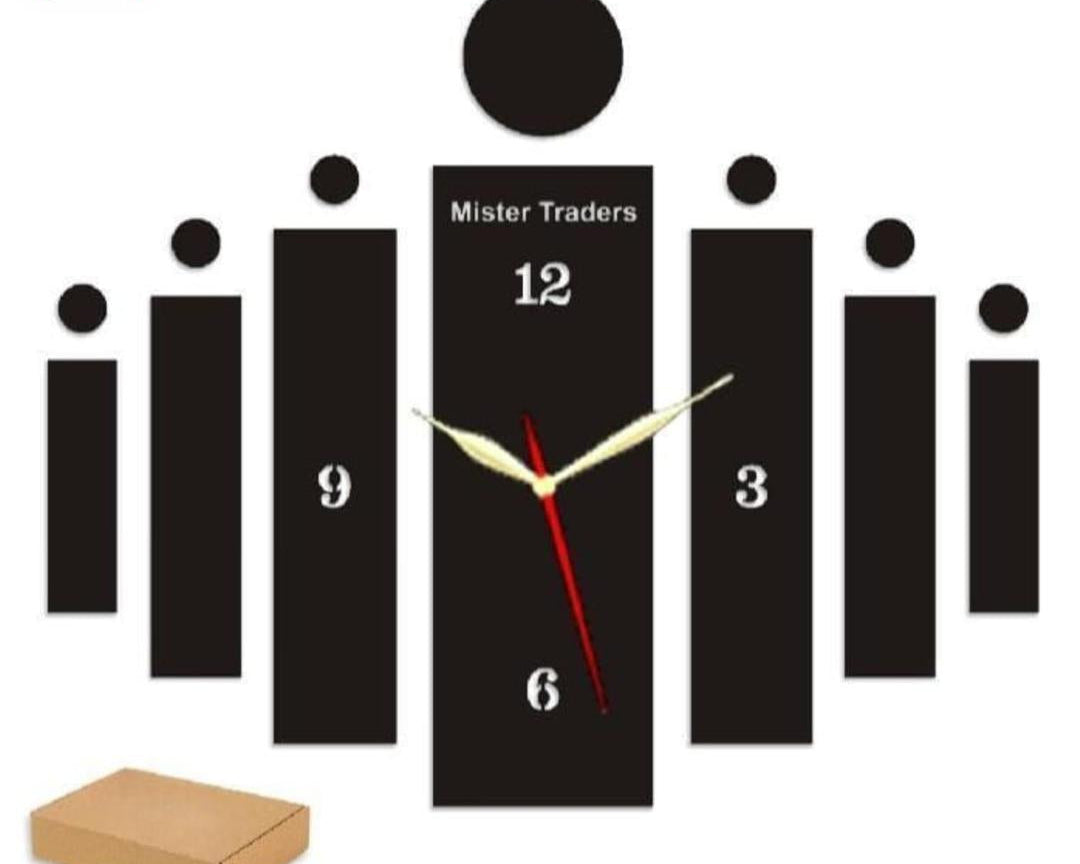 Black wall clock with staggered bars and round accents installed on a wall