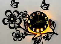 3D flower wall clock with butterflies displayed above curtains