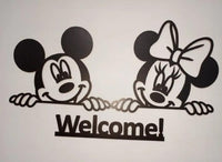 Two cartoon mouse characters peeking above Welcome lettering